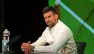 Serbia's Novak Djokovic attends a Press Conference in the Media Theatre in the Broadcast Centre, after losing to Spain's Carlos Alcaraz in their men's singles final tennis match on the fourteenth day of the 2024 Wimbledon Championships at The All England Lawn Tennis and Croquet Club in Wimbledon, southwest London, on July 14, 2024. (Photo by Joe TOTH / various sources / AFP)
