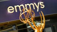 File: An Emmy statue is seen on the red carpet ahead of the 74th Emmy Awards at the Microsoft Theater in Los Angeles, California, on September 12, 2022. (Photo by Chris Delmas / AFP)