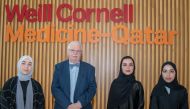 WCM-Q students Batoul Arabi (left), Shahad Sabaawi Ibrahim, and Raghad Sabaawi Ibrahim with Dr. Dietrich Büsselberg. 
