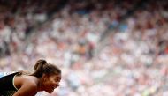 USA's Gabrielle Thomas celebrates after winning the Women's 200m event during the IAAF Diamond League athletics meeting at the London stadium in London on July 20, 2024. (Photo by Benjamin Cremel / AFP)
 