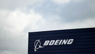 A logo is seen on the Boeing stand on the opening day of the Farnborough International Airshow 2024, south west of London, on July 22, 2024. (Photo by JUSTIN TALLIS / AFP)