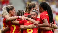 Spain's midfielder #06 Aitana Bonmati celebrates with teammates after scoring her team's first goal in the women's group C football match between Spain and Japan during the Paris 2024 Olympic Games at La Beaujoire Stadium in Nantes on July 25, 2024. (Photo by Alain Jocard / AFP)