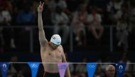 Palestine's Yazan Al Bawwab reacts before a heat of the men's 100m backstroke swimming event at the Paris La Defense Arena in Nanterre, on July 28, 2024. (Photo by Oli Scarff / AFP)