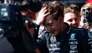 Mercedes' British driver George Russell reacts after winning the Formula One Belgian Grand Prix at the Spa-Francorchamps Circuit in Spa on July 28, 2024. (Photo by SIMON WOHLFAHRT / AFP)