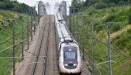 A high-speed train by French railway company SNCF travels on the Bordeaux-Paris route at reduced speed, at Chartres, northern France on July 26, 2024, after the resumption of high speed train services on the line between Paris and Bordeaux, following suspected acts of sabotage on the country's rail network ahead of the opening ceremony of the 2024 Paris Olympic Games. Photo by JEAN-FRANCOIS MONIER / AFP