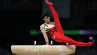 Japan's Daiki Hashimoto competes in the pommel horse event of the artistic gymnastics men's team final during the Paris 2024 Olympic Games at the Bercy Arena in Paris, on July 29, 2024. (Photo by Gabriel Bouys / AFP)