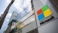 File: A sign hangs on the exterior of the Microsoft Corp. Fifth Avenue flagship store in New York on July 14, 2018. (Photo by Mark Kauzlarich/Bloomberg)
