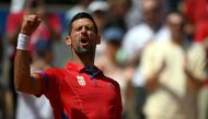 Serbia's Novak Djokovic react to beating Germany's Dominik Koepfer on Court Philippe-Chatrier at the Roland-Garros Stadium in Paris on July 31, 2024. (Photo by Carl De Souza / AFP)
 