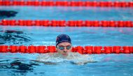 France's Leon Marchand reacts after a heat of the men's 200m individual medley swimming event during the Paris 2024 Olympic Games at the Paris La Defense Arena in Nanterre, west of Paris, on August 1, 2024. Photo by François-Xavier MARIT / AFP.