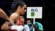 Algeria's Imane Khelif leaves after her women's 66kg preliminaries round of 16 boxing match against Italy's Angela Carini during the Paris 2024 Olympic Games at the North Paris Arena, in Villepinte on August 1, 2024. (Photo by MOHD RASFAN / AFP)
