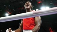 Refugee Olympic Team’s Cindy Ngamba reacts after beating France’s Davina Michel yesterday. 