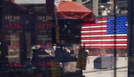 Stock market statistics are displayed in the window of the Nasdaq MarketSite in Times Square in New York City on August 5, 2024. (Photo by CHARLY TRIBALLEAU / AFP)
