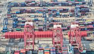 A cargo ship loaded with containers berths at a port in Lianyungang, in eastern China's Jiangsu province on August 7, 2024. Photo by AFP.