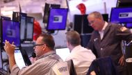 Traders work on the floor of the New York Stock Exchange during morning trading on August 12, 2024 in New York City. Photo by Michael M. Santiago / GETTY IMAGES NORTH AMERICA / Getty Images via AFP.