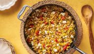 Skillet orzo with corn, tomatoes and feta. (Photo by Rey Lopez for The Washington Post; food styling by Carolyn Robb for The Washington Post)

