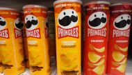 Packages of Pringles potato chips are displayed for sale in a store on August 14, 2024 in Los Angeles, California. (Photo by Mario Tama/Getty Images/AFP)
