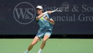 Jannik Sinner of Italy plays a forehand during his match against Alex Michelsen of the United States during Day 4 of the Cincinnati Open at the Lindner Family Tennis Center on August 14, 2024 in Mason, Ohio. (Photo by Dylan Buell / GETTY IMAGES NORTH AMERICA / Getty Images via AFP)
