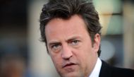 File: Actor Matthew Perry arrives at the Los Angeles premiere of 17 Again at the Grauman's Chinese Theater in Hollywood, California, April 14, 2009. (Photo by Gabriel Bouys / AFP)