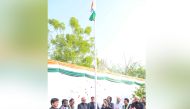 Indian Ambassador H E Vipul with other officials during the flag hoisting ceremony yesterday.