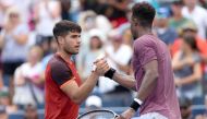 Carlos Alcaraz of Spain congratulates Gael Monfils of France after their match during Day 6 of the Cincinnati Open at the Lindner Family Tennis Center on August 16, 2024 in Mason, Ohio. Photo by MATTHEW STOCKMAN / GETTY IMAGES NORTH AMERICA / Getty Images via AFP