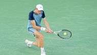 Jannik Sinner of Italy plays a backhand during his match against Frances Tiafoe of the United States during the Final Day of the Cincinnati Open at the Lindner Family Tennis Center on August 19, 2024 in Mason, Ohio. (Photo by Dylan Buell / GETTY IMAGES NORTH AMERICA / Getty Images via AFP)
