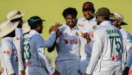 Bangladesh's players celebrate after the dismissal of Pakistan's Saim Ayub during the first day of the first Test cricket match between Pakistan and Bangladesh at the Rawalpindi Cricket Stadium in Rawalpindi on August 21, 2024. (Photo by Farooq NAEEM / AFP)
