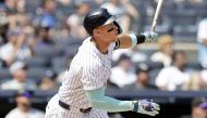 Aaron Judge #99 of the New York Yankees follows through on his first inning two run home run against the Colorado Rockies at Yankee Stadium on August 25, 2024 in New York City. (Photo by Jim McIsaac / GETTY IMAGES NORTH AMERICA / Getty Images via AFP)
