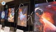 The Cosmic Canvas-Space Art Exhibition at the Al Thuraya Planetarium in Katara features artworks and photographs that capture the wonders of space.