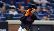 Francisco Lindor #12 of the New York Mets hits an RBI single in the fourth inning against the Boston Red Sox at Citi Field on September 02, 2024 in New York City. (Photo by Mike Stobe / GETTY IMAGES NORTH AMERICA / Getty Images via AFP)
