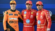 Pole position winner Ferrari's Monegasque driver Charles Leclerc (C) poses with second placed McLaren's Australian driver Oscar Piastri (L) and third placed Ferrari's Spanish driver Carlos Sainz after the qualifying session ahead of the Formula One Azerbaijan Grand Prix at the Baku City Circuit in Baku on September 14, 2024. Photo by Natalia KOLESNIKOVA / AFP.