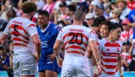 Japan's players celebrate their victory during the Pacific Nations Cup semi-final rugby union match between Japan and Samoa at the Prince Chichibu Memorial Rugby Ground in Tokyo on September 15, 2024. (Photo by Philip FONG / AFP)