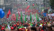 Protestors march during a demonstration in support of the employees of the Audi factory threatened with closure in Belgium and to call on the European Union to invest in the industrial sector, in Brussels on September 16, 2024. Photo by Nicolas TUCAT / AFP