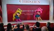 Lion dancers perform in front of guests at the official unveiling of Christie's new Asia Pacific headquarters at the Henderson Centre in Hong Kong on September 20, 2024. (Photo by Peter PARKS / AFP)