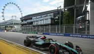 Mercedes' British driver Lewis Hamilton drives during the third practice session ahead of the Formula One Singapore Grand Prix in Singapore on September 21, 2024. (Photo by Lillian Suwanrumpha / AFP)
 