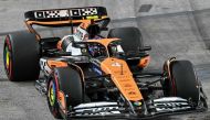 McLaren's British driver Lando Norris drives during the second practice session ahead of the Formula One Singapore Grand Prix night race at the Marina Bay Street Circuit in Singapore on September 20, 2024. (Photo by Roslan Rahman / AFP)