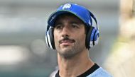 RB's Australian driver Daniel Ricciardo arrives for the drivers' parade before the Formula One Singapore Grand Prix night race at the Marina Bay Street Circuit in Singapore on September 22, 2024. (Photo by Lillian SUWANRUMPHA / AFP)