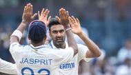 India’s Ravichandran Ashwin (right) celebrates with teammate Jasprit Bumrah after taking a wicket.