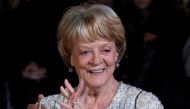 (FILES) A file photo taken on October 15, 2012, shows British actress Maggie Smith on the red carpet as she arrives to attend the premiere of 'Quartet' during the 56th BFI London Film Festival in London. Oscar-winning British actor Maggie Smith, a star of stage and screen for more than seven decades, died in hospital in London on Friday, September 27, her sons announced. (Photo by ANDREW COWIE / AFP)
