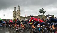 Photo used for demonstration purposes. The pack rides past the Grossmunster church during the women's Elite Road Race cycling event during the UCI 2024 Road World Championships, in Zurich, on September 28, 2024. Photo by Fabrice COFFRINI / AFP.