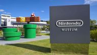 (Files) This photo taken on September 24, 2024 shows signage in the courtyard of the new Nintendo Museum, located inside a renovated old factory, during a media preview in suburbs of Kyoto. (Photo by Richard A. Brooks / AFP)