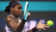 USA's Coco Gauff hits a return to Czech Republic's Karolina Muchova in Beijing on October 6, 2024. (Photo by Greg Baker / AFP)