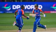 India's captain Harmanpreet Kaur (R) and her teammate Deepti Sharma take a run during the ICC Women's T20 World Cup cricket match between Pakistan and India at the Dubai International Cricket Stadium in Dubai on October 6, 2024. (Photo by Giuseppe CACACE / AFP)