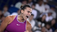 Belarus's Aryna Sabalenka reacts during women痴 singles semi-final match against Coco Gauff of US at the Wuhan Open tennis tournament in Wuhan, China's Hubei province on October 12, 2024. (Photo by WANG Zhao / AFP)
