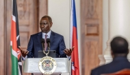 President of Kenya William Ruto delivers his remarks during a joint press conference with Prime Minister of Haiti Garry Conille (unseen) at the State House in Nairobi on October 11, 2024. (Photo by LUIS TATO / AFP)
