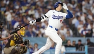 Shohei Ohtani #17 of the Los Angeles Dodgers strikes out against the San Diego Padres during the sixth inning of Game Five of the Division Series at Dodger Stadium on October 11, 2024 in Los Angeles, California. (Photo by Sean M. Haffey / GETTY IMAGES NORTH AMERICA / Getty Images via AFP)
