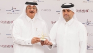 Qatar Airways Group Chief Executive Officer, Engr. Badr Mohammed Al Meer (right) and Qatar Post Chairman and Managing Director, Faleh bin Mohammed Al Naemi at the agreement signing.