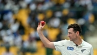 New Zealand's Matt Henry gestures during the second day of the first Test cricket match between India and New Zealand at the M. Chinnaswamy Stadium in Bengaluru on October 17, 2024. (Photo by Idrees Mohammed / AFP) /