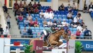 Cyrine Cherif guides Van Gallettana Z over a fence. 