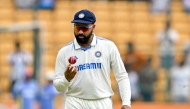 India's captain Rohit Sharma fields the ball during the fifth and final day of the first Test cricket match between India and New Zealand on October 20, 2024. (Photo by Idrees Mohammed / AFP) 