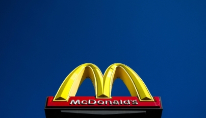 The McDonald's logo is pictured in front of a store in Dearborn, Michigan, on October 17, 2024. Photo by Charly TRIBALLEAU / AFP